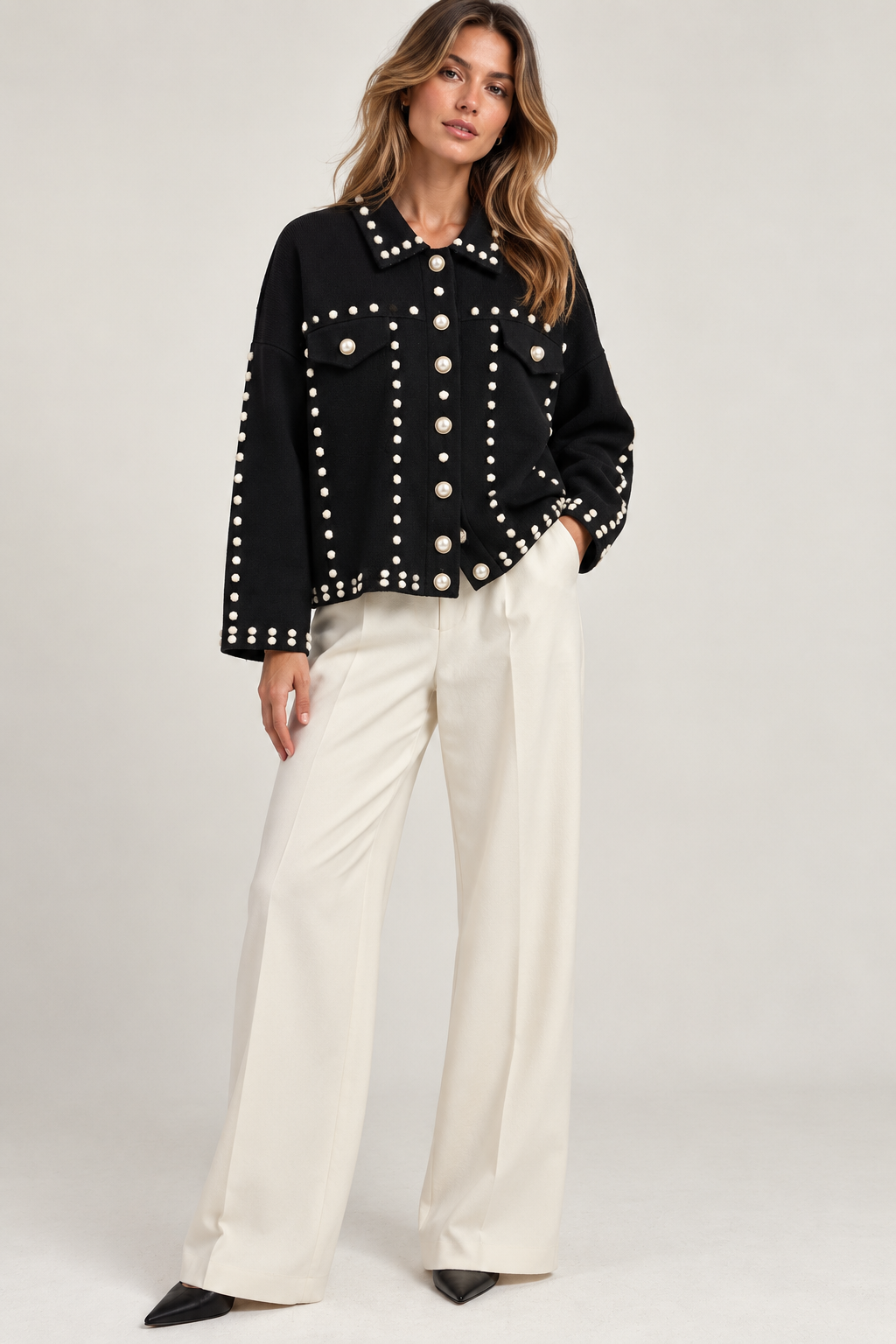 CHAQUETA DE PUNTO NEGRA